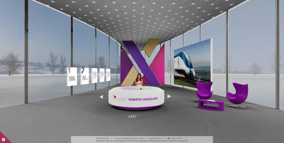 A reception hall inside a 3D pavilion for doctors: a glazed space in a snow field, a filmed presenter behind the desk and information panels floating in the air.